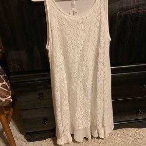 Cream colored dress super cute, never worn.